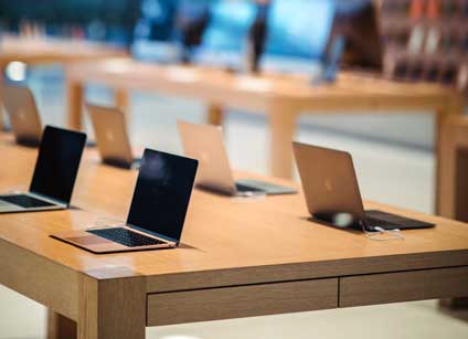 Laptops for sale in a computer store.