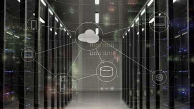 A large bank of servers with an overlay showing the cloud symbol.