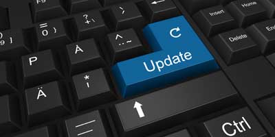 A section of a computer keyboard with a blue “Update” button.