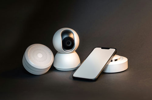 Smart devices including a wireless speaker, webcam and cellphone.
