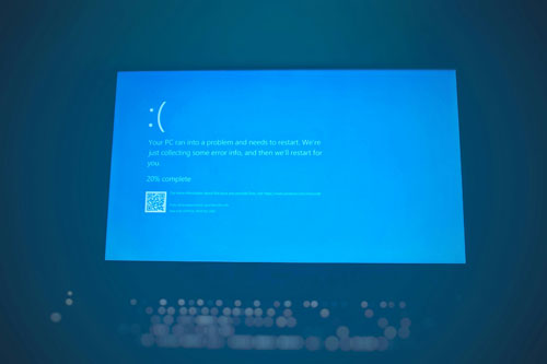 A screen showing the Microsoft Windows recovery screen (blue screen).