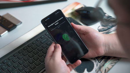 Multifactor authentication using fingerprint recognition on a cell phone.