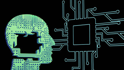 A circuit board shaped like a human head tied to computer circuitry.